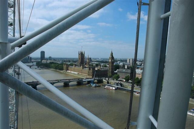 London Eye - looking through spokes at Parliament