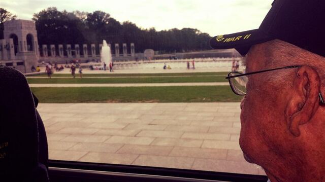 grandpa looks at his wwii memorial one last time before heading back to the airport