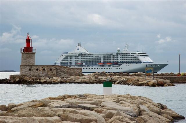 Voyager anchored in the distance