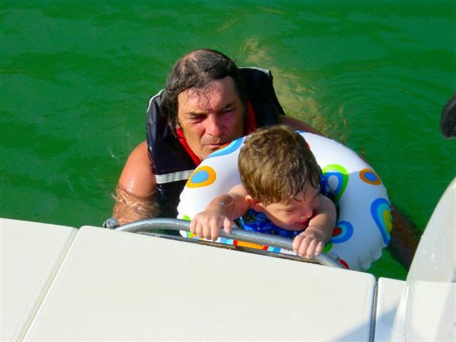 ben-and-grandpa-climbing-out-of-the-water