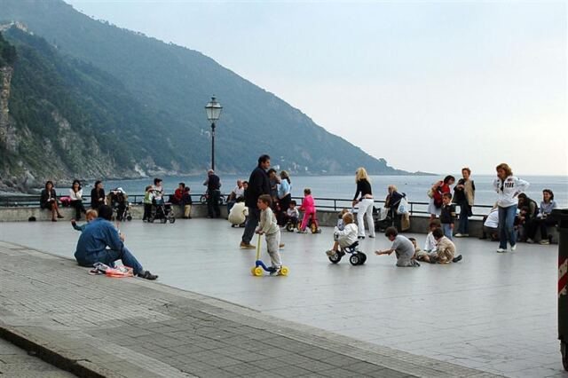Italian children play under their mothers' watchful eyes