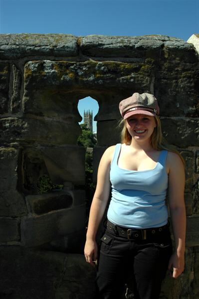 Melanie atop the tower, with Warwick Cathedral in the distance