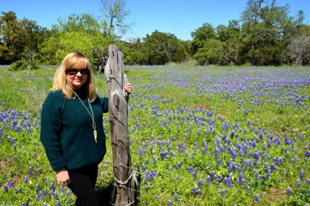 Kathy and field of bluebonnets